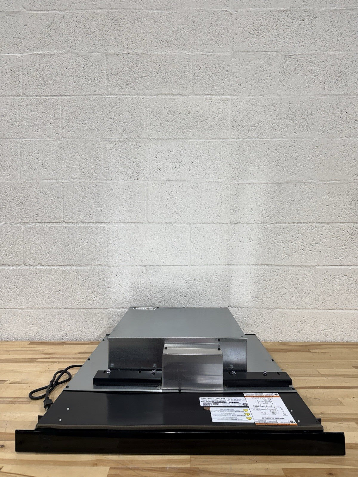 GE 30 inch Telescoping Black Ducted Downdraft Range Hood UVD6301DP1BB