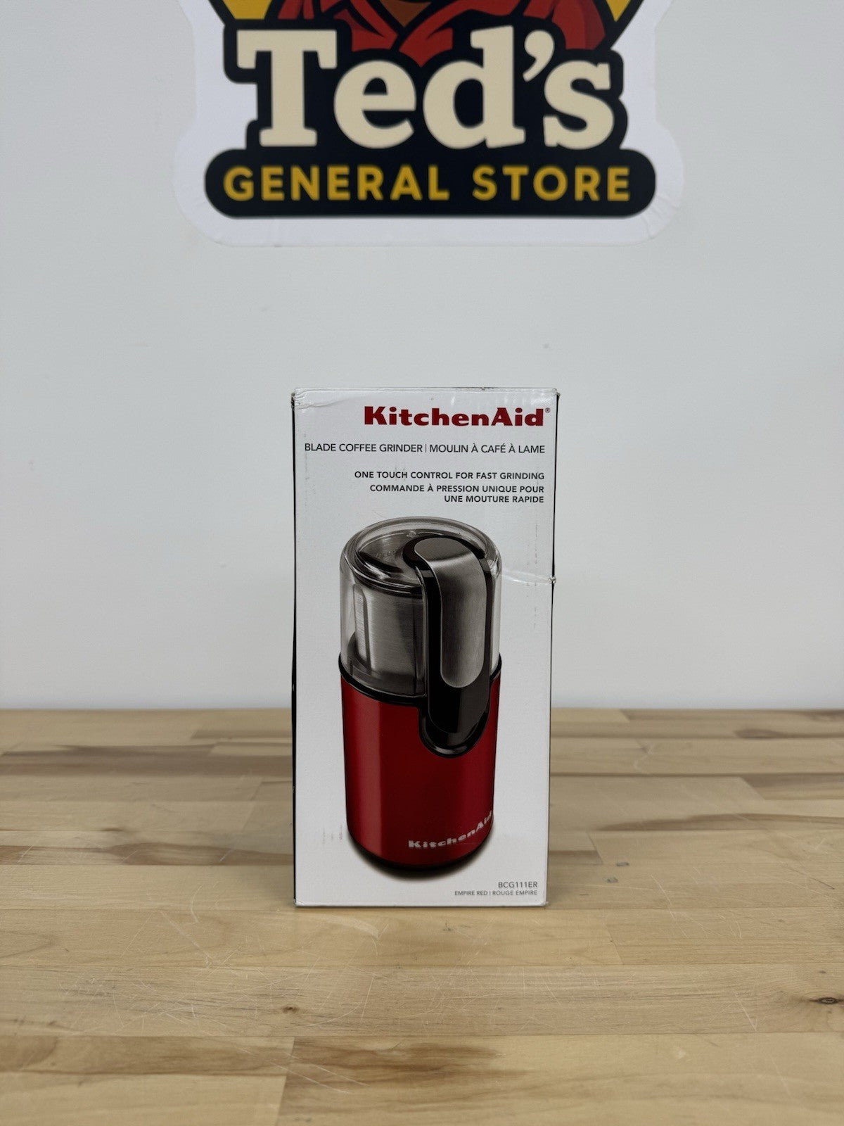 KitchenAid Blade Coffee Grinder in Stainless Steel on Empire Red